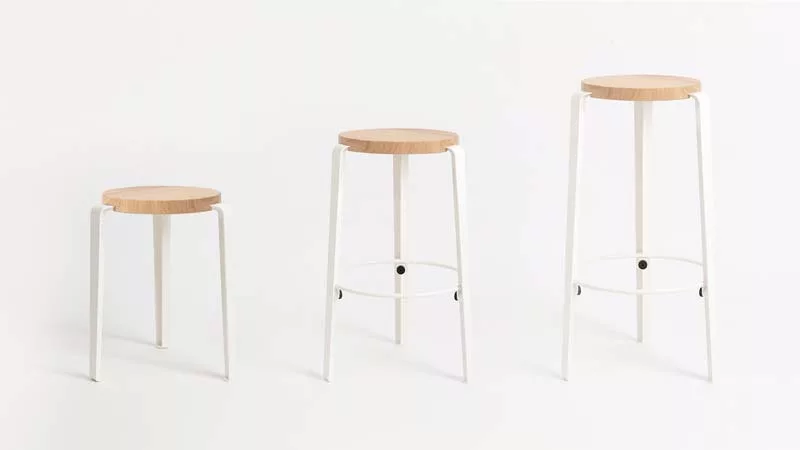 Three minimalist white and wood stools